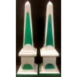 Interior Decoration - a pair of malachite green and white stone obelisks, 43cm high