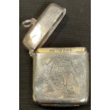 A large Victorian silver vesta case, crested, London 1888