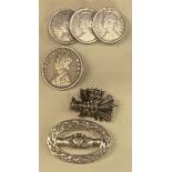 A Victorian triple set quarter Rupee brooch; another, half Rupee; a silver hand and heart brooch; an