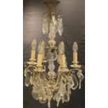 A 20th century silvered and clear glass six light ceiling light, S scroll arms, prismatic