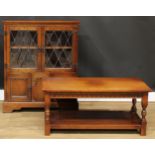 An oak side cabinet, 102.5cm high, 84.5cm wide, 26cm deep; a similar coffee table, 45cm high,