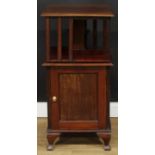 An unusual early 20th century revolving bookcase cabinet, 91.5cm high, 46cm wide, 45cm deep, c.1925