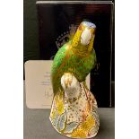 A Royal Crown Derby paperweight, Amazon Green Parrot, limited edition 1,202/2,500, gold stopper,