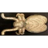 An early 20th century cast iron novelty boot pull, as a beetle, marked Regd. Design, 25cm long
