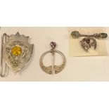 Jewellery - Scottish silver brooches; a Cairngorm buckle (4)