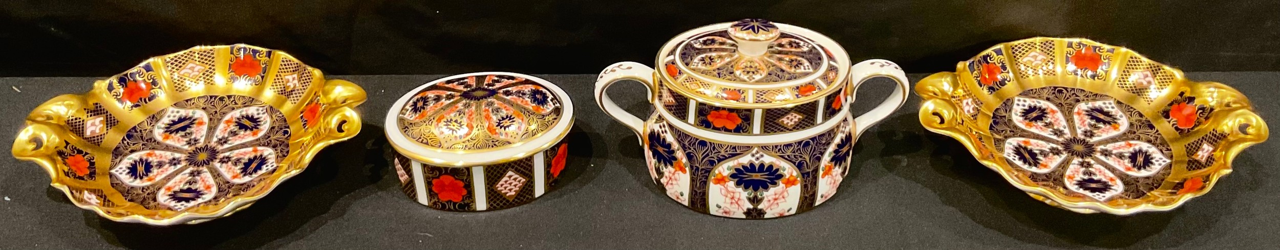 A Royal Crown Derby Imari palette 1128 pattern sucrier and cover, first quality; a pair of 1128