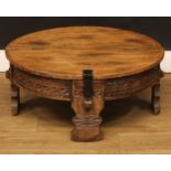 An Indian circular low table, hinged top, 31cm high, 73cm diameter