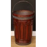A substantial Victorian style mahogany fireside peat bucket or log bin, in the Irish Gothic