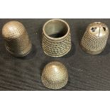 A Medieval style silver beehive thimble; other silver thimbles (5)