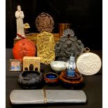 Boxes and Objects - a 19th century chalk figure of a Holy Man; a small oval plaster plaque, Massacre