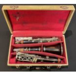 A Console clarinet, in fitted carry case with accessories