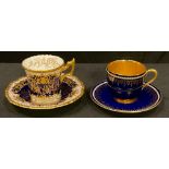 A Royal Worcester cabinet coffee cup and saucer, the cobalt ground heavily gilded, printed mark in