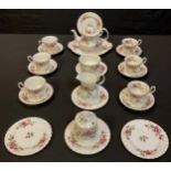 A Royal Albert Moss Rose tea service for six comprising teapot, cream jug, sucrier, cake plate, side