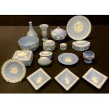 A Wedgwood Jasperware sucrier and cover, sugar bowl, bell, assorted vases, trinket box and cover,