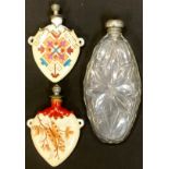 A 19th century porcelain scent bottle, decorated with butterfly and leaves; another, decorated