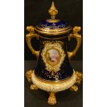 A Coalport two handled vase and cover, the central oval cartouche painted with a river landscape,