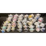 Teapots - assorted late 19th/early 20th century continental porcelain souvenir teapots, British