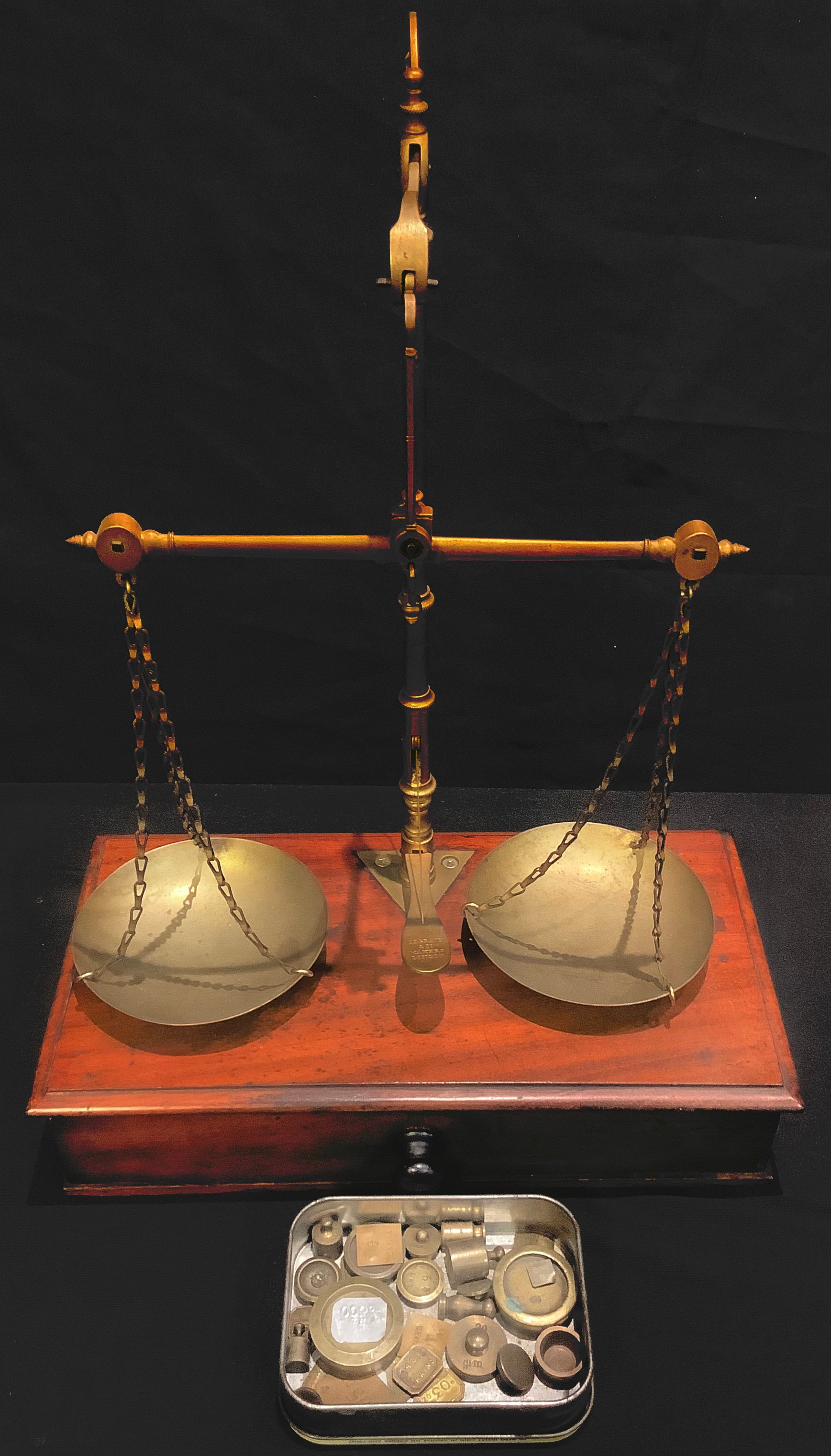 A set of 19th century mahogany and brass apothecary balance scales and weights, De Grave & Co.,