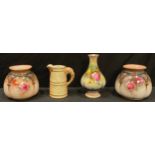 A pair of Hadley's Worcester ovoid quatrefoil vases, the blush grounds painted with pink blossom,