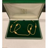 A 9ct gold fancy link necklace, marked 375, 33.5cm drop, 14g, boxed