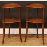 A pair of Bevan Funnell Reprodux mahogany serpentine etageres or side tables, labels to