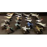 A set of twenty three miniature model military planes, including F - 117 Nighthawk, Mirage 2000,