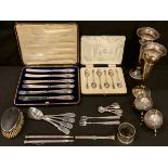 A set of six silver coffee spoons, Sheffield, 1929; a set of four silver fiddle pattern teaspoons,