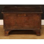 An oak plank chest, hinged cover, 47cm high, 74cm wide, 44.5cm deep