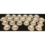 A Minton Haddon Hall pattern tea set comprising thirteen teacups and saucers; a set of ten Minton