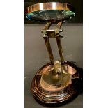 A replica Watts & Sons, London, articulated desktop magnifying glass, extending to 44cm high