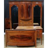 An Edwardian mahogany bedroom suite, comprising compactum wardrobe, 215cm high, 191cm wide, 68cm