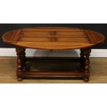 An oak drop-leaf coffee table, by Titchmarsh & Goodwin, badged, 48cm high, 96cm opening to 121cm