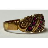 A Victorian six stone garnet ring, 15ct gold mount and shank