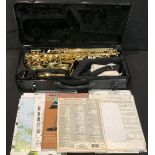 A Volt Voggenreiter alto saxophone, hard carry case; with assorted conforming modern jazz and