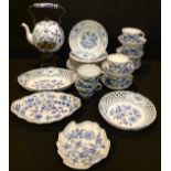 A Meissen Onion pattern tea service, comprising tea kettle on stand, oval dish, another, circular,