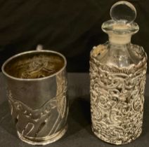 A Victorian silver christening mug, Sheffield 1896; a silver cased scent bottle (2)
