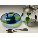 An Art Nouveau glass preserve jar and cover; an iridescent green and blue Art Glass vase (2)