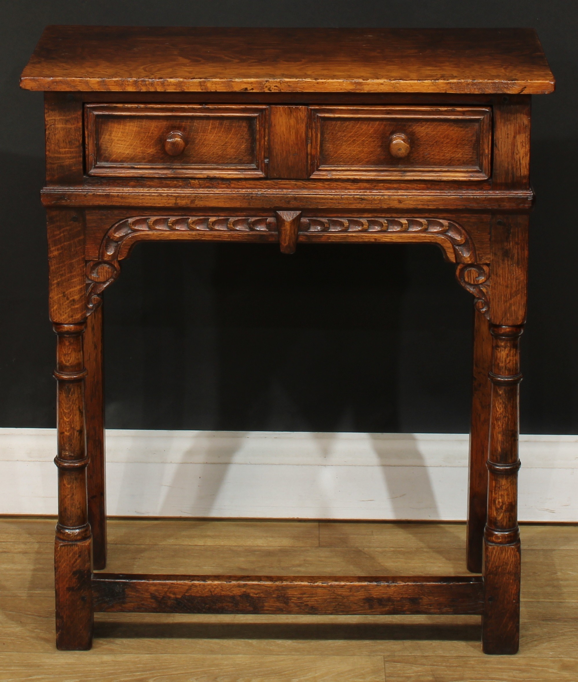 An oak side table, of small and neat proportions, possibly Titchmarsh & Goodwin, 71cm high, 61cm