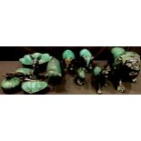 Blue Mountain Pottery animal models, in a dripped green glaze, buffalo, bear, lion, deer, dolphin,