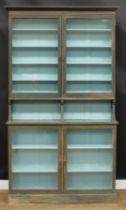 A late 19th/early 20th century shop display cabinet, 210cm high, 121cm wide, 25cm deep