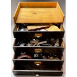Horology - various watch parts and watches, in a four drawer cabinet, 29cm x 31cm