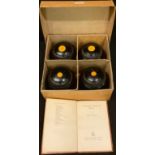 A set of four Taylor-Rolph Tyrolite bowls, The Imp Brand, original cardboard box; a book, Hugh de