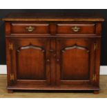 An oak side cabinet or low dresser, probably Titchmarsh & Goodwin, 84cm high, 107cm wide, 45.5cm