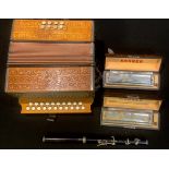 A Hohner piano accordeon (sic), Marca Germany; two Hohner 64 chromonica, boxed; another; a flute (4)