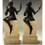 A matched pair of Art Deco style contemporary dark patinated bronzes, fashionable 1920s dancing girl
