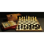 A novelty chess set, plastic figural pieces in medieval dress, a marquetry inlaid chess board; a