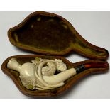 A meerschaum cheroot holder, with birds and flowers, cased