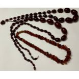 A cherry amber bead necklace; another; an amber necklace (3)