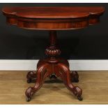 A Victorian mahogany card table, hinged top enclosing a baize lined playing surface, fluted