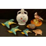 A set of three Beswick wall hanging flying kingfishers, impressed marks 729-1; a Jay on presentation